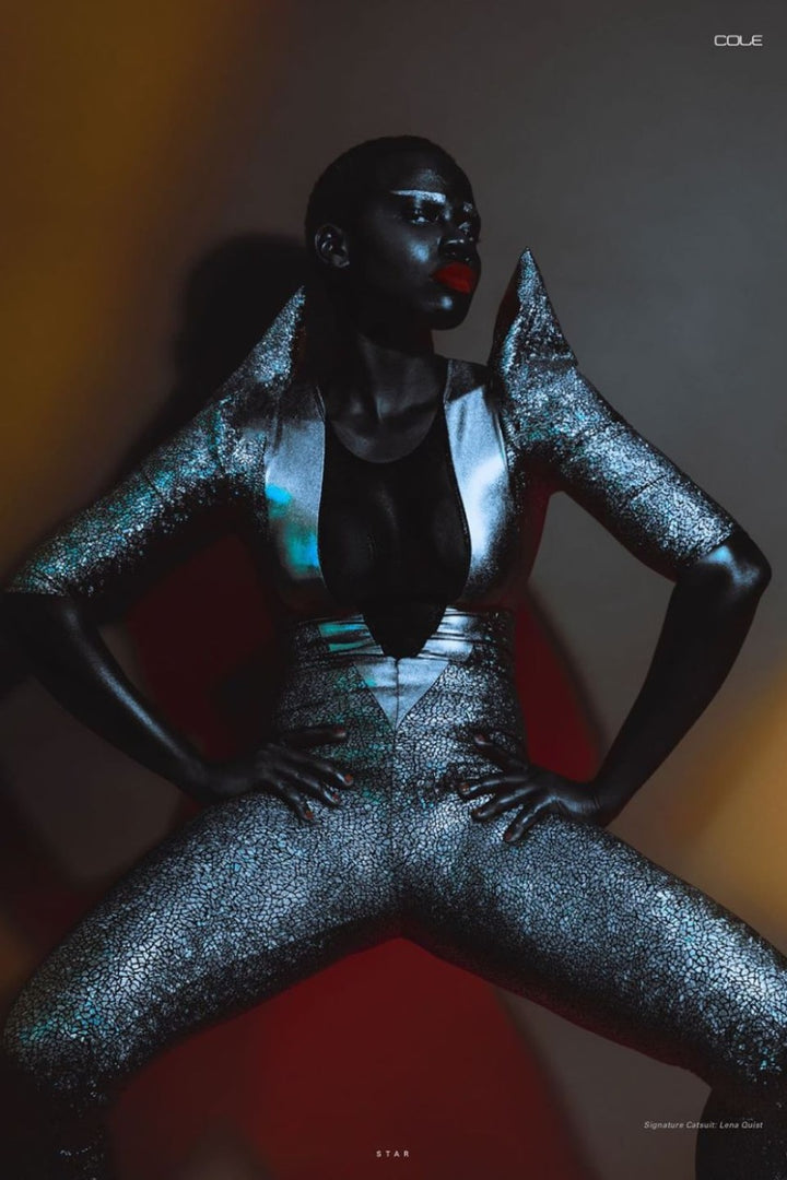 Sexy Deep V Catsuit In Gold Holographic, Metallic & Mesh | Pointy Puff Sleeve Catsuit